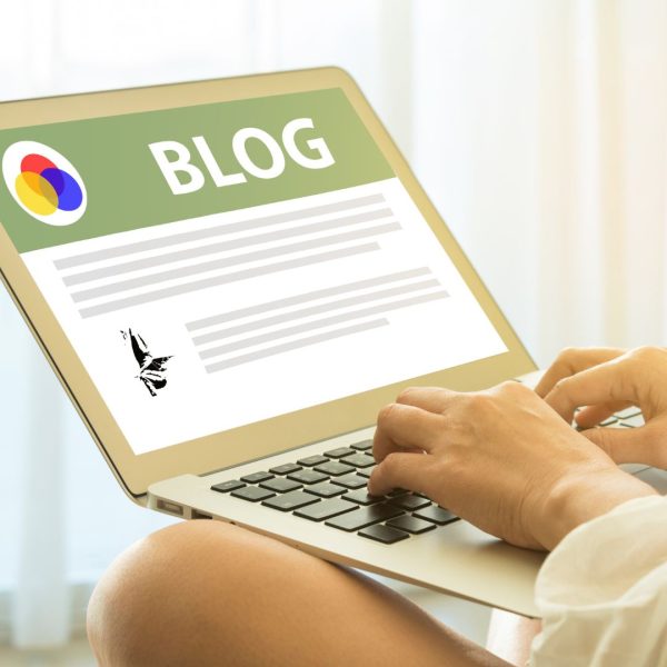 Women sit at work writing blog