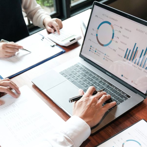 a person is working on a laptop and making a SEO report